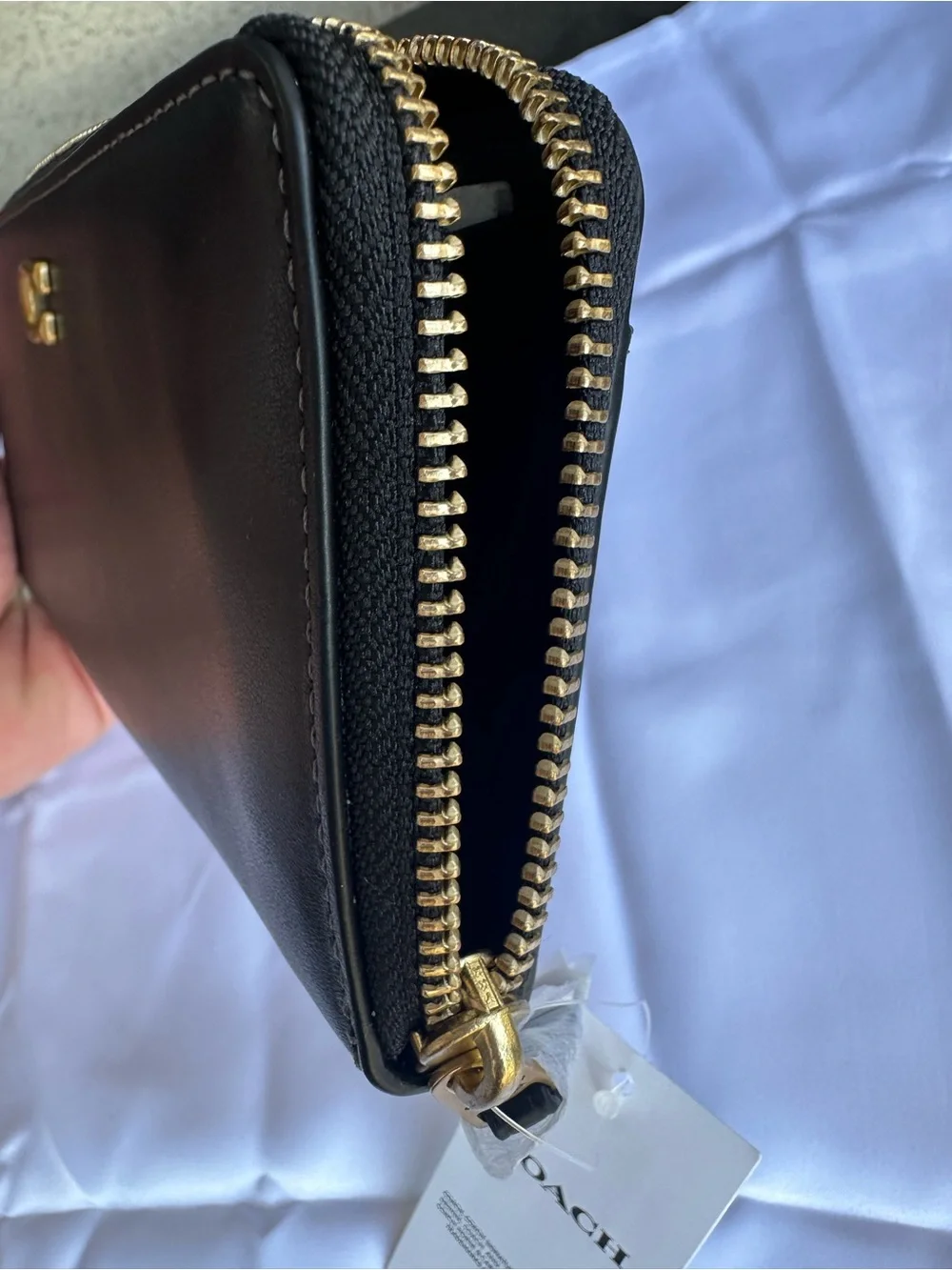 Coach Black Leather Zip Phone Wallet with Gold Tone Hardware